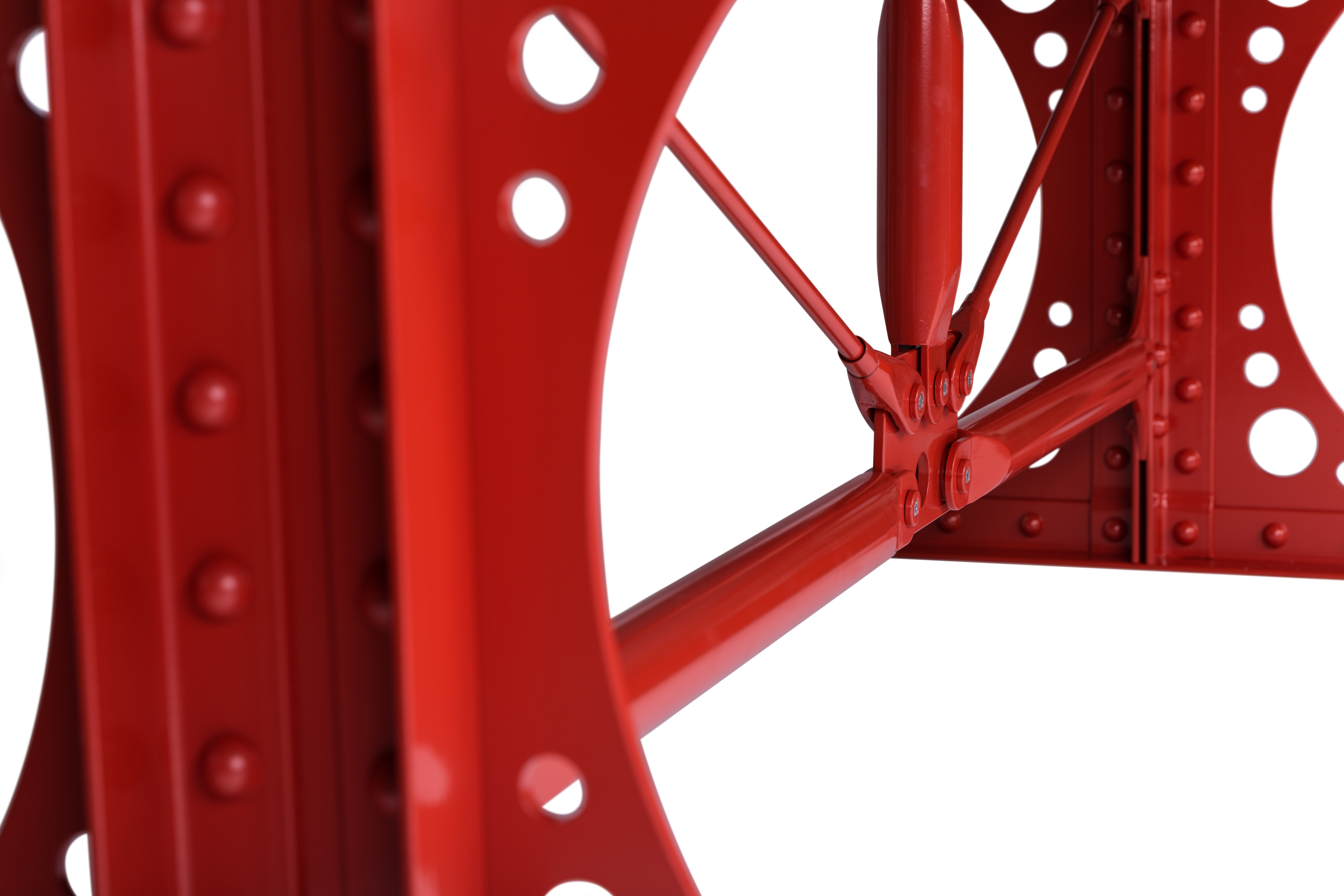 Red table legs structure close up view